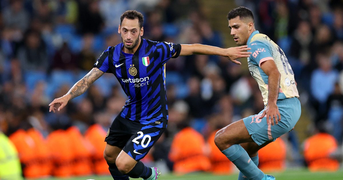 Calhanoglu e Rodri durante Manchester City-Inter